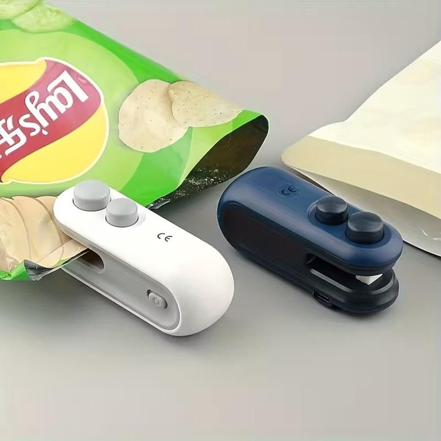 Oplaadbare Mini Heat Sealer met Snijmes + 1 Oplaadkabel Luchtdicht Zakjes Afdichten & Afsluiten Geschikt voor Thuis Picknick. Uitje Reizen Voedsel Snacks