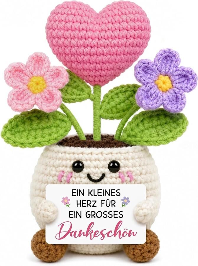 Geschenk met gehaakte hartvormige bloem en dankkaart